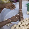 Women preparing food credit Basic / Ekta Parishad
